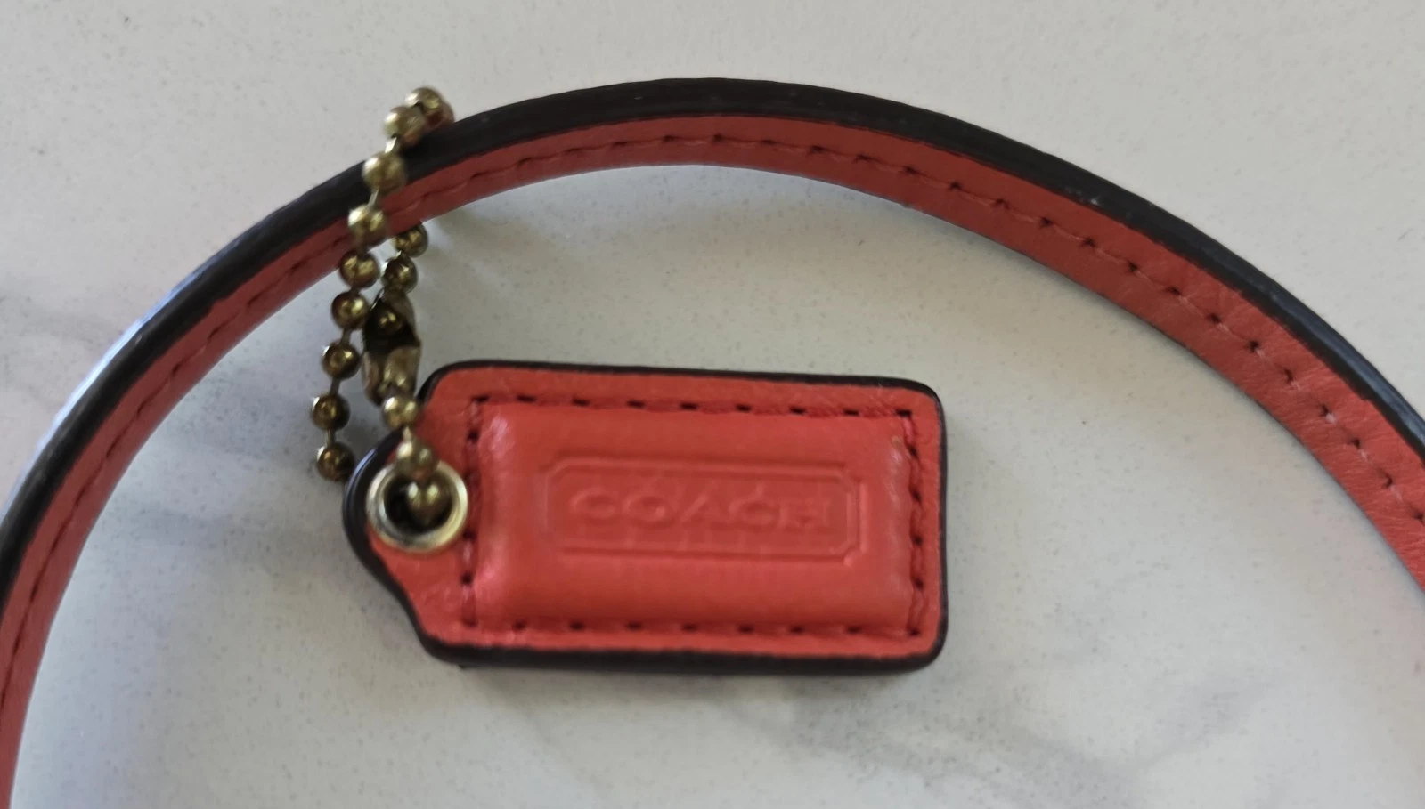 Polso medio vintage Coach F49472 Park arancione pelle chiusura girevole tasca