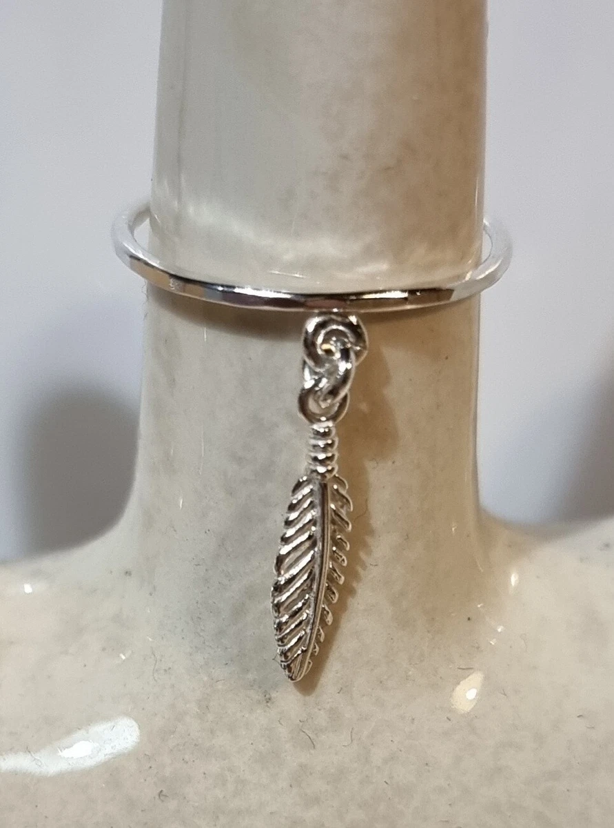 Ring with hotsell feather charm