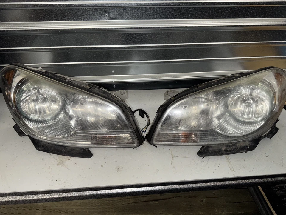 Juego de faros laterales izquierdo+derecho Chevrolet Malibu 2008 a 2012 OEM L5973 DW Foto 2 de 2