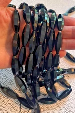 ONE STRAND FACETED  TAPERED TUBE BLACK ONYX 30/10 MM  BEAD STRAND 15.5 INCHES!!!