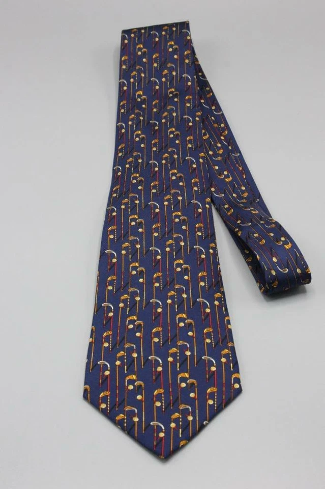 Corbata de seda SALVATORE FERRAGAMO. Motivo de golf azul con rojo y marrón. Foto 2 de 4