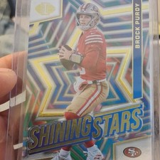 Panini Illusions Shining Stars Brock Purdy #18 Football Card 49ers Insert 2024