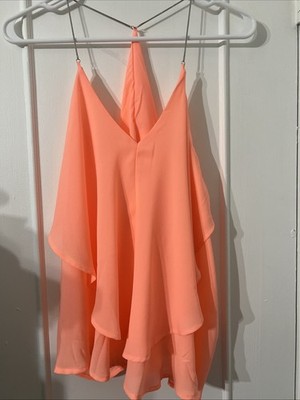 Venus Brand Orange Top.  Sleek And Impressionable.