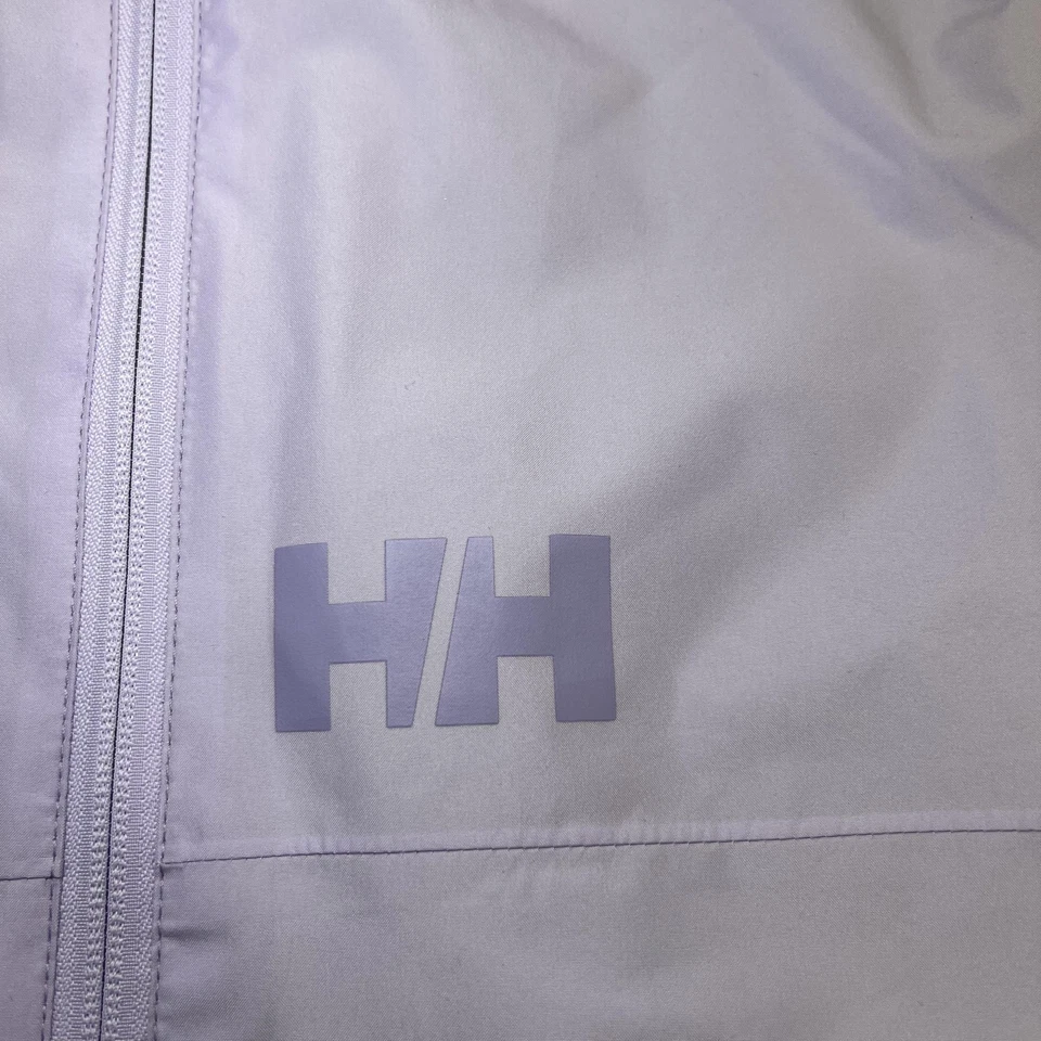 Chaqueta cortavientos Helly Hansen para mujer 16 púrpura con capucha resistente al agua logotipo HH Foto 2 de 4