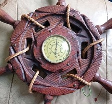 Antique Thermometer in the form of a ship's steering wheel.