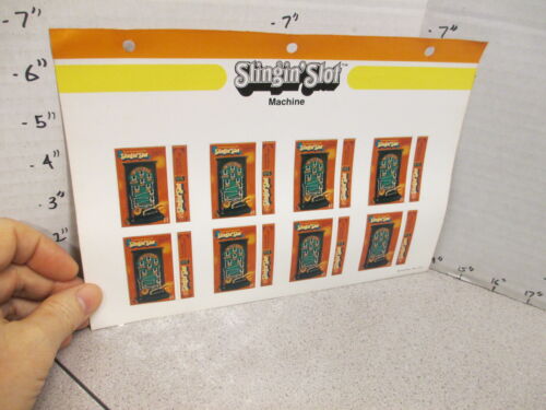 MATTEL 1975 toy store display sticker sheet SLINGIN SLOT machine upright game - Picture 1 of 2