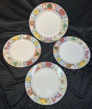 4 Tabletops Unlimited "Happy Everything" salad/dessert plates w/holiday themes