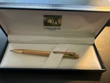 Bolígrafo Caran dAche chapado en oro Swiss Made en una caja (Elro-Werke)