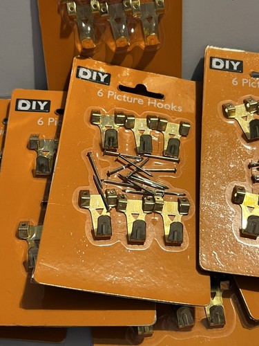 Kit 6 ganci per appendere foto cornice portafoto set chiodi ottone sigillati nuovi - Foto 3 di 6
