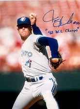 Tom Henke Autographed Photograph With '92 W.S. Champs Inscription and COA