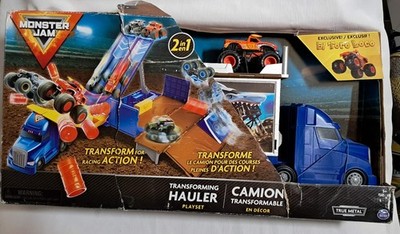 MONSTER JAM 2-IN-1 TRANSFORMING HAULER & RAMP JUMP PLAYSET- box damage