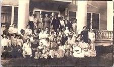 Large Multi Generation Family Group on Porch, Early 1900s RPPC Postcard