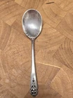 Queen's Lace sterling silver cream soup spoon by International Silver.