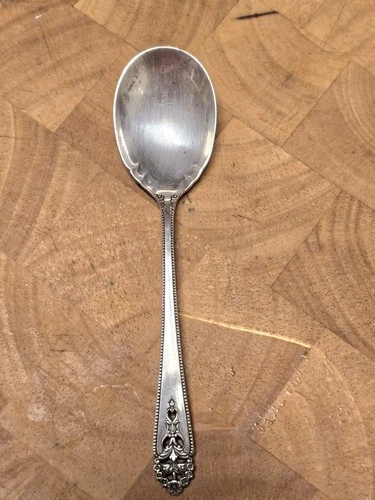 Queen's Lace sterling silver cream soup spoon by International Silver.