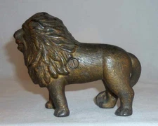 Antique Gold Colored Cast Iron Still Penny Bank Standing Lion With Tail Right