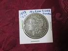 ONE (1) 1878CC MORGAN SILVER DOLLAR NEAR FINE CONDITION