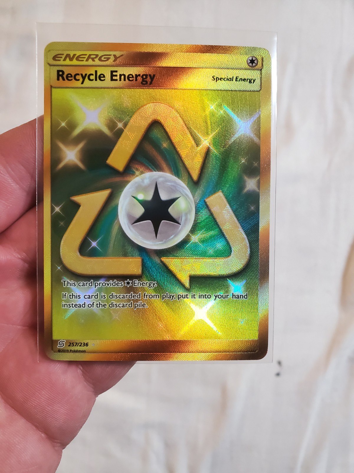 LP/NM Pokemon Card Recycle Energy 257/236 Unified Minds Gold Secret Rare