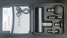 Fabric percussion massager gun kit with 4 speeds, includes 4 black heads.