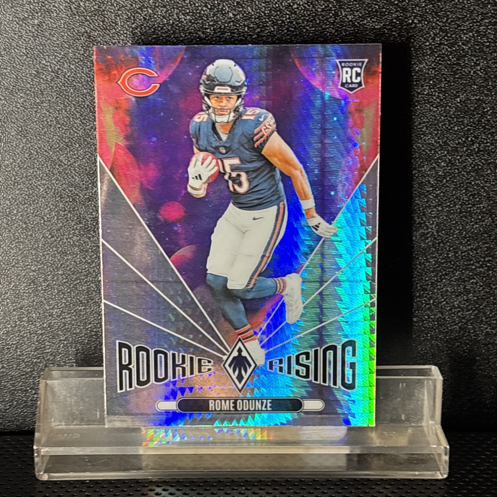 2024 Panini Phoenix - Rookie Rising Rome Odunze #RR-ROE Hyper (RC)