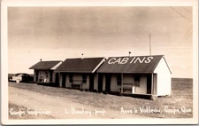 PC2951 Canada PQ Quebec Gaspe Anse a Valleau Cabins Roadside Scene Postcard RPPC