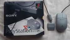 A collection of non-standard PlayStation PS1 controllers inc. boxed PS mouse