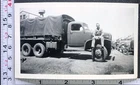 WW2 Era Military BW Photo Snapshot Soldier Sitting on Transport Truck Vehicle