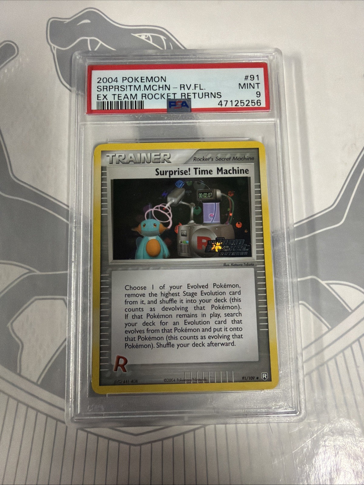 2004 Pokémon EX Team Rocket Returns 91 Surprise! Time Machine Reverse PSA 9