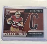2024 Panini Donruss Elite Christian McCaffrey Spellbound Red /75 - Letter (C)