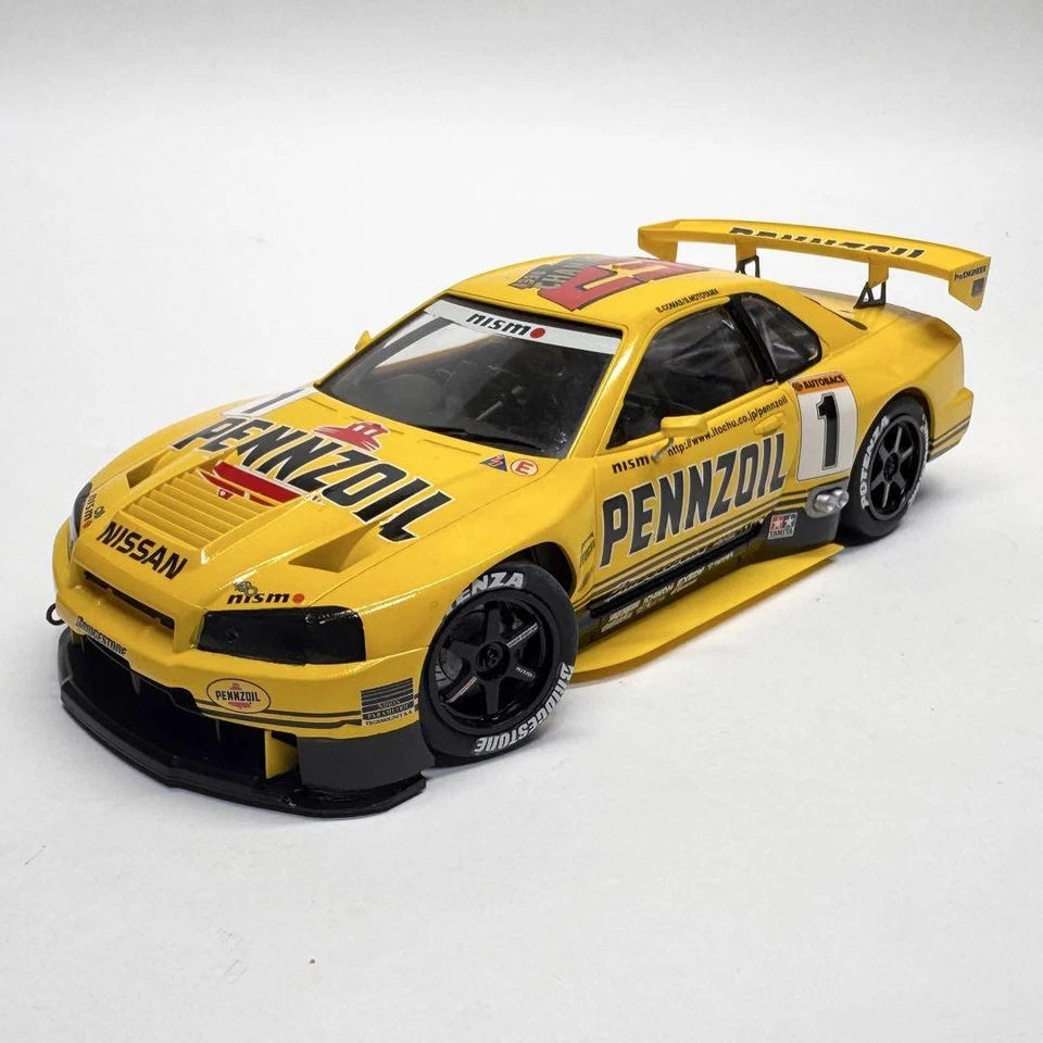 TAMIYA 1/24 NISSAN PENNZOIL NISMO GT-R (R34) Model Kit Plastica #654 - Immagine 3 di 4