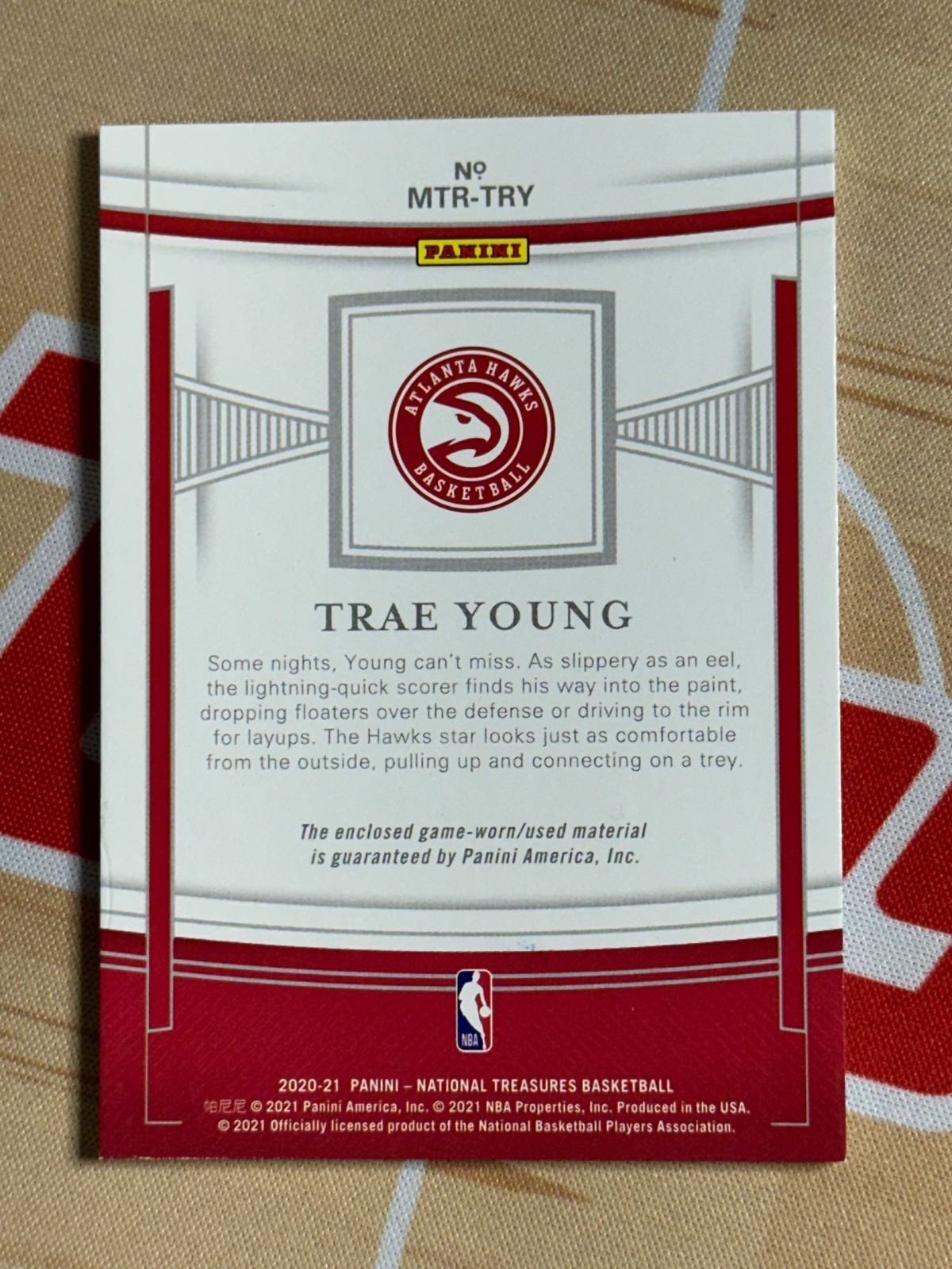 2020-21 National Treasures Trae Young Game Used Tag Patch #1/1 SSP view 2