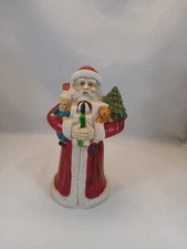 SANTA CLAUS ST NICOLAS CERAMIC FIGURINE MUSICAL ROTATING CHRISMAS 8 1/4" TALL.