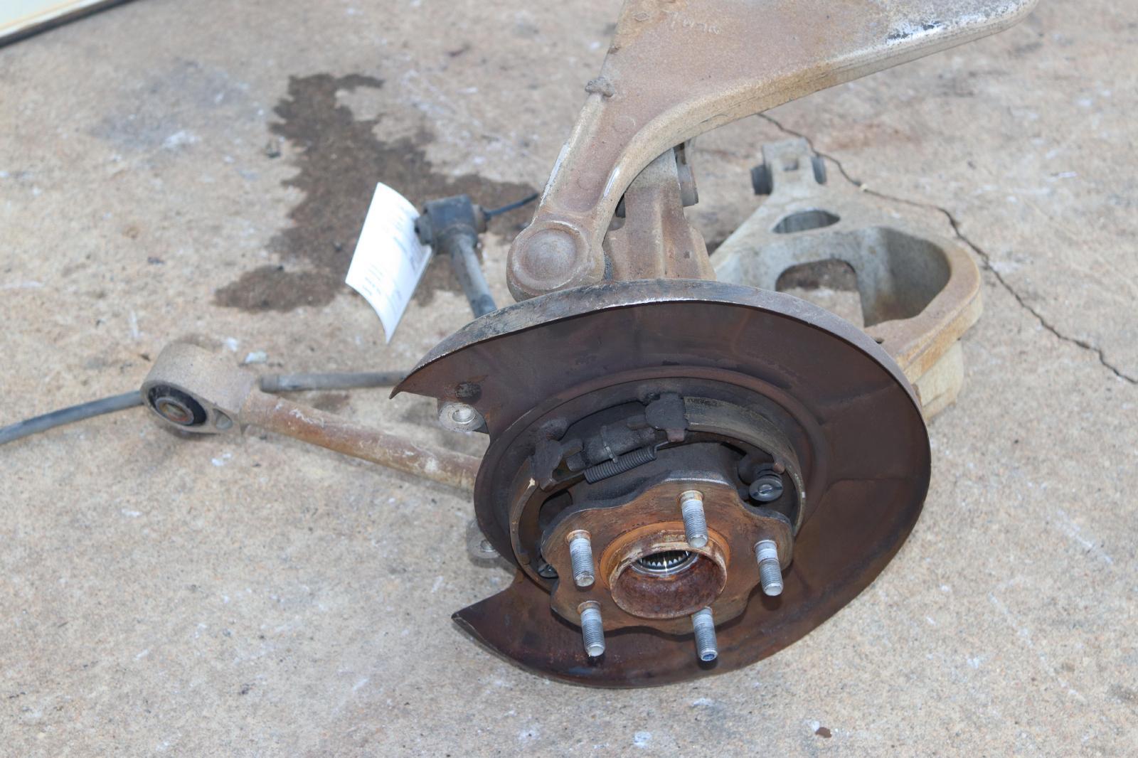 20072008 INFINITI G35 SEDAN REAR LEFT SPINDLE KNUCKLE HUB W/ CONTROL