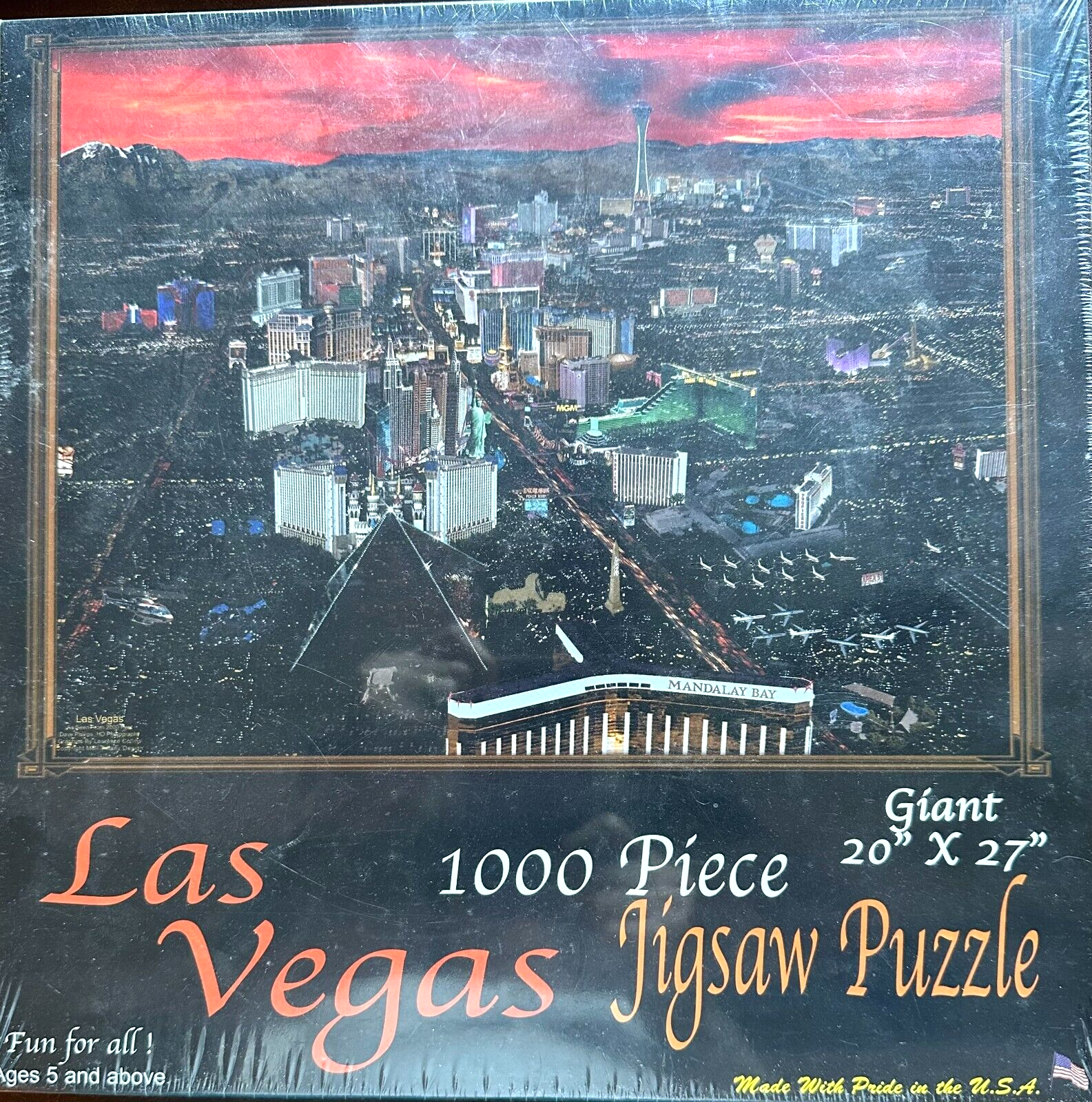 Las Vegas 1000pc Puzzle Featuring Mandalay Casinos Space Needle Mountains and Red Sky