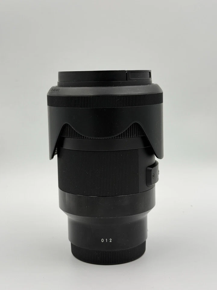 Lente Sigma 35mm f/1.4 DG DN para câmeras sem espelho Sony montagem tipo E quadro completo - Imagem 2 de 4