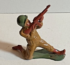 Manoil soldier firing in the air postwar