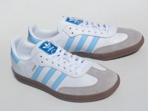 white and light blue adidas