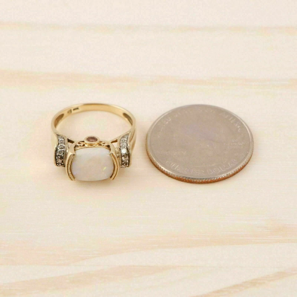 Anillo solitario de 2,50 quilates con acabado de oro amarillo de 14 quilates ópalo de fuego/diamante corte ovalado Foto 4 de 4