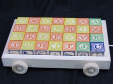 uncle goose classic abc blocks with pull wagon