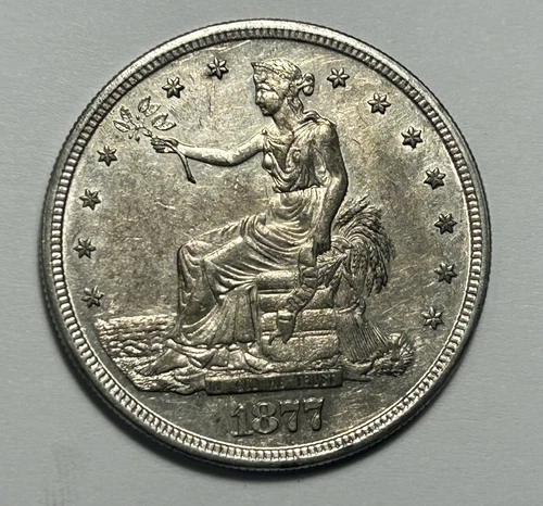 1877 S TRADE DOLLAR AU