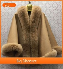 Poncho in vera lana cashmere con orlo in pelliccia di volpe intorno al mantello scialle in pelliccia da donna