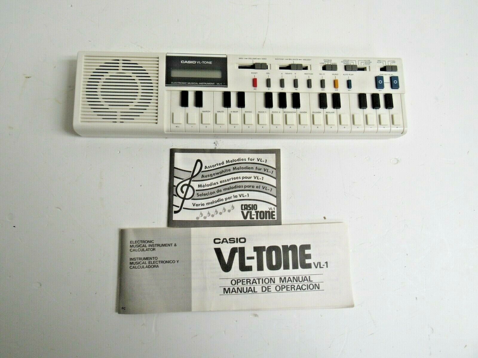 CASIO VL-1 VL-Tone Electronic Keyboard Instrument & Calculator  w/Instructions