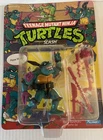 Vintage 1990 Playmates Teenage Mutant Ninja Turtles "Slash" Figure Unpunched