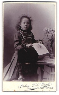 Photograph Joh. Graf, Winterthur, Niedergasse 13, girl in dress with a fo 