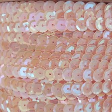 Sequin Trim Pink Blush Rainbow 8mm Cup Facet strung by the yard. Made in USA.