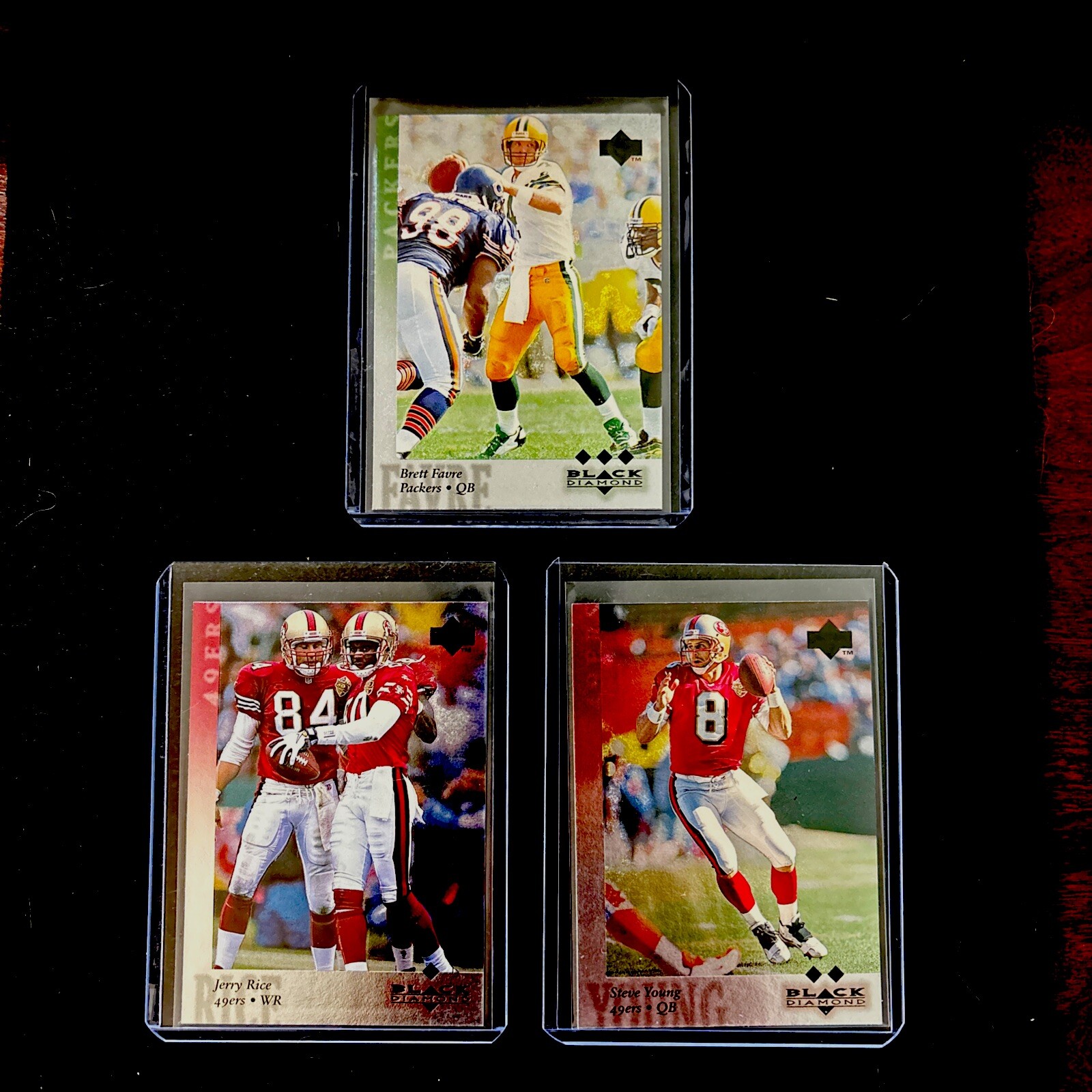 1997 Upper Deck  Black Diamond Bret Favre, Jerry Rice, Steve Young  3-Card Lot