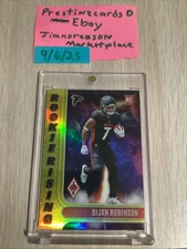 2023 Panini Phoenix - Rookie Rising Bijan Robinson #RIS-6 Yellow /75 (RC)