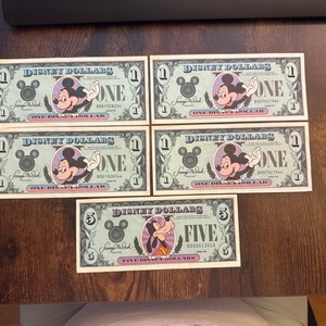 $1 Dollar (4) and $5 Dollar (1) Disney Dollars in Mint Condition