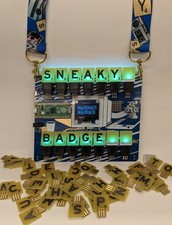 Sneaky Badge DEF CON 31 badgelife badge from Defcon 31, with letter pack.