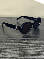 Celine CL40194U 01A — black oval sunglasses Triomphe