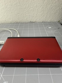 Nintendo 3ds Xl Red Used. Comes with Stylus, 4gb Sd Card, and Charging Cable.